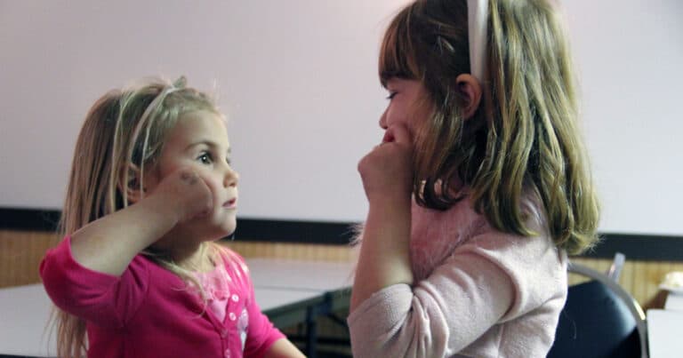 Children using sign language