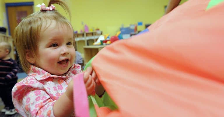 Girl doing speech therapy activity